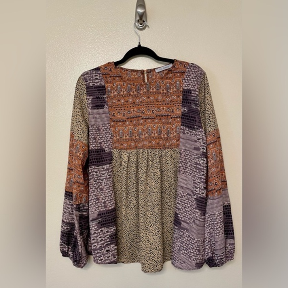Ces Femme Mixed Panel Prints Long Bubble Sleeve Top. Super cute.